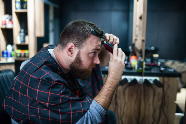 istock Barber Giving Himself A Nice Haircut 1468901642