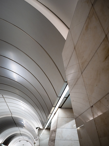 ceiling and marble wall in underground subway passage in Moscow city