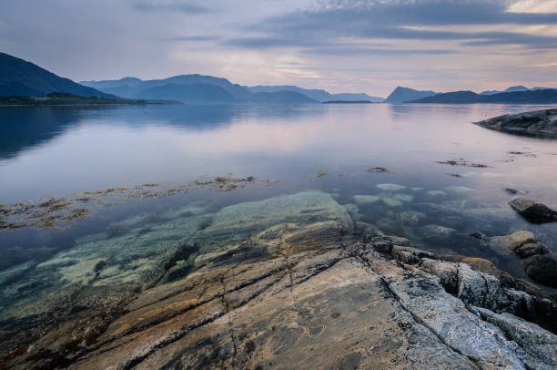 seascape with mountains in the distance