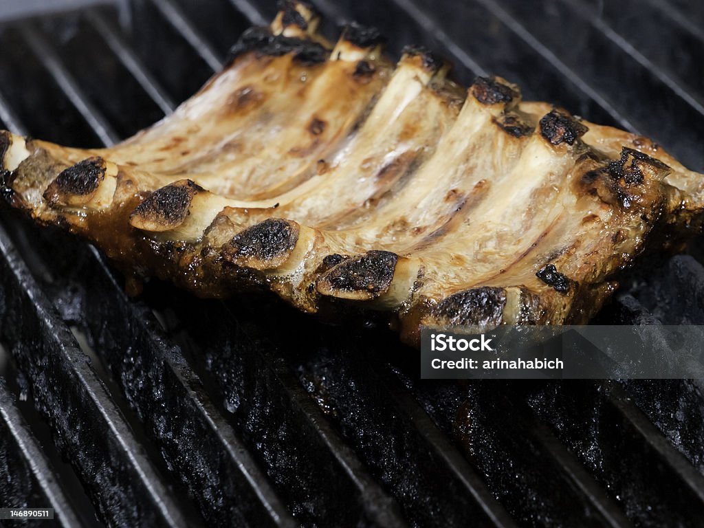 Barbecue costolette - Foto stock royalty-free di Barbecue - Cibo