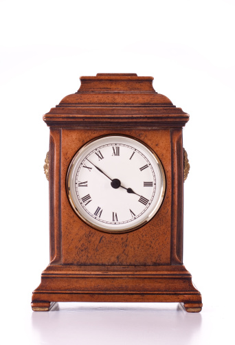 A clock commonly placed on the mantlepiece in the living room