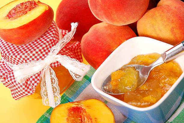 compota de pêssego - preserves jar apricot marmalade imagens e fotografias de stock