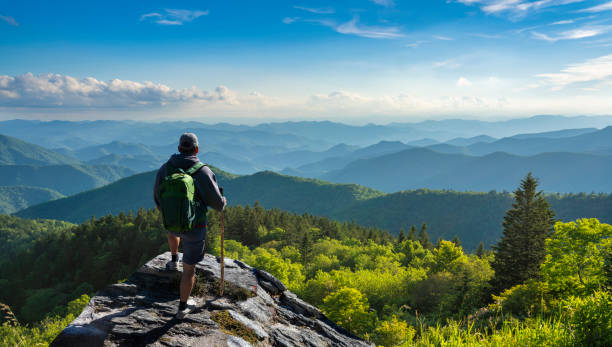 man relaxing on hiking trip in the mountains. - appalachia mountains imagens e fotografias de stock