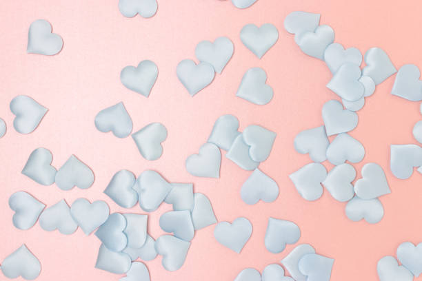 istock Texture made of blue textile confetti in a heart shape. 1468909385