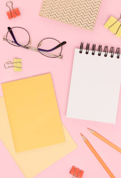 istock School supplies and eyeglasses on a pink background. 1468909451