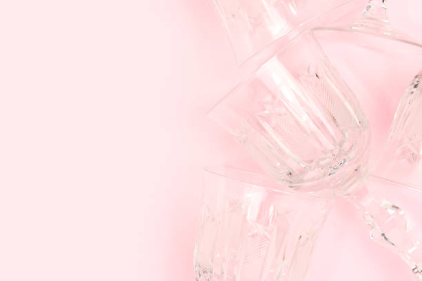 istock Crystal glasses on a pink background. 1468911260