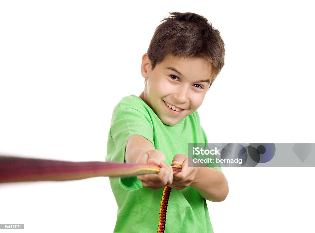 Boy Using A Rope Boy Pulling A Rope Stock Photo - Download Image Now - Child, White ...