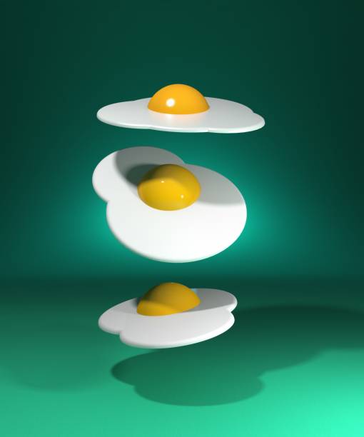 Fried eggs dropping on a green and teal background.
