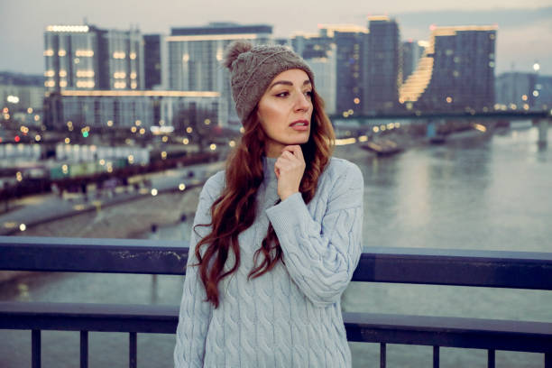 istock Woman standing in front of modern skyline 1468913211