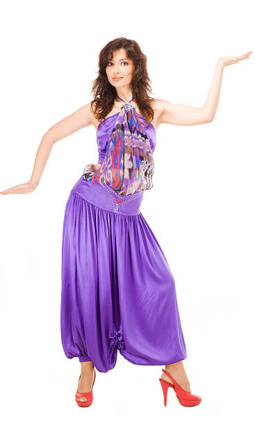 istock woman in evening dress dancing 146891606