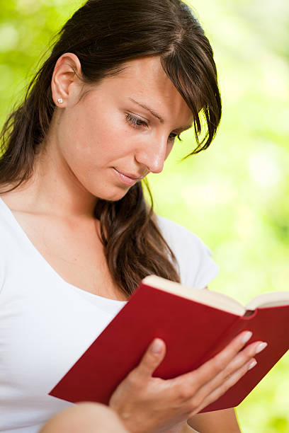 istock Pretty girl reading the book 146891672