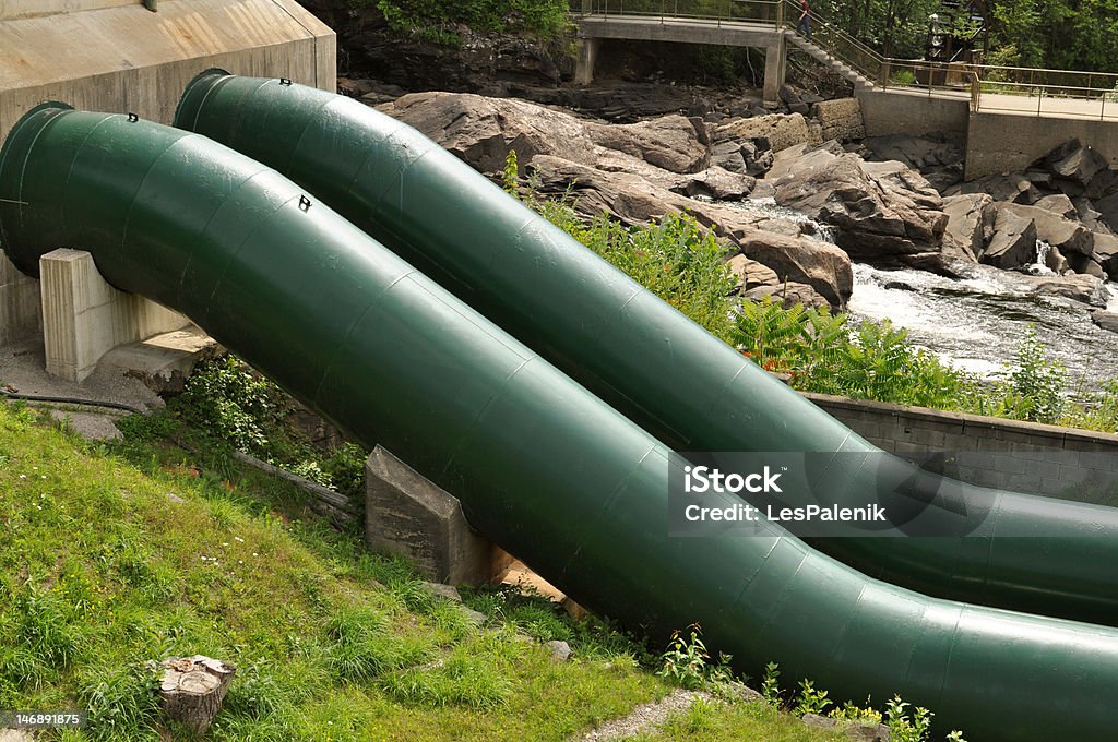 Green water pipes Large water pipes at a hydro dam Water Pipe Stock Photo