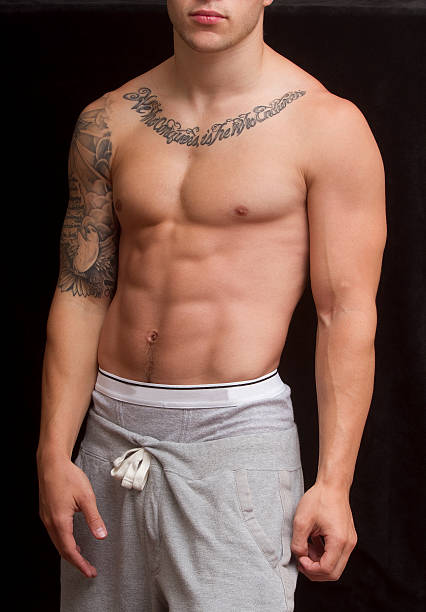 3,061 Mens Stomach Tattoos Stock Photos, Pictures & Royalty-Free Images - iStock 3,061 Mens Stomach Tattoos Stock Photos, Pictures & Royalty-Free Images - iStock