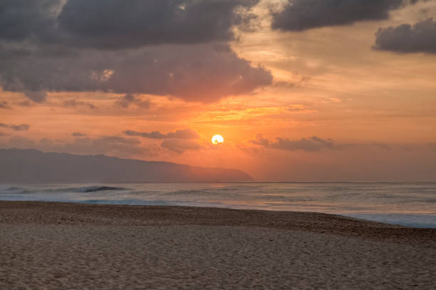 istock Hawaiian sunset looking to Kaena Point 1468922949