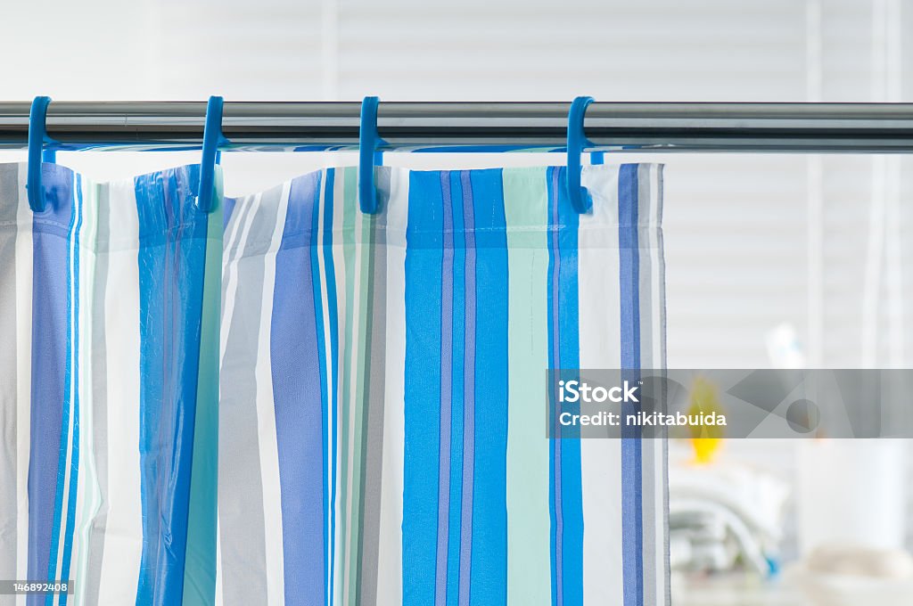 Close-up of a striped shower curtain Blue shower curtain in the bathroom Shower Curtain Stock Photo