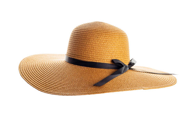 istock Womens summer yellow straw hat with black ribbon on white background 1468924577