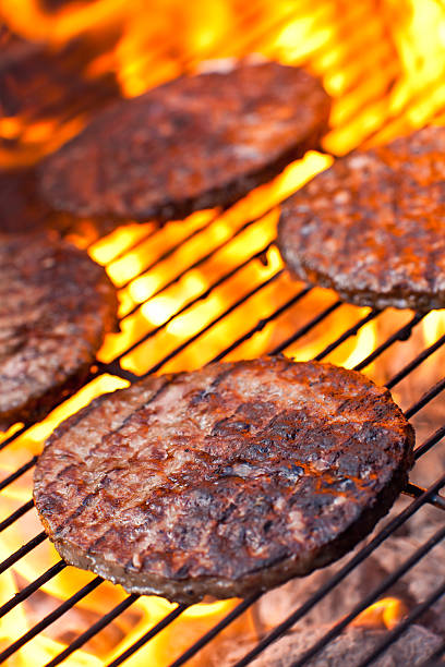 istock Large beefburgers on a BBQ 146892508