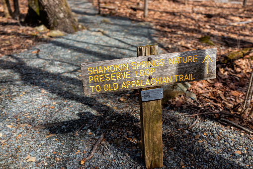 Wintergreen, USA - March 18, 2022: Virginia ski resort in Blue Ridge mountains with sign for Shamokin Springs Nature Preserve Loop hiking to old Appalachian trail