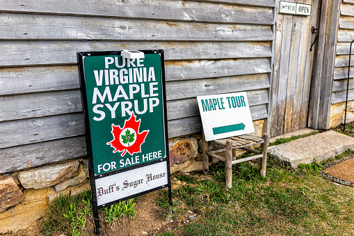Monterey, USA - March 19, 2022: Fair Lawn Farm Duff's Sugar House maple syrup business sign for tour and store shop in Highland county, Virginia at festival