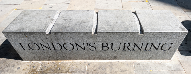 London's Burning Sign at Monument to The Great Fire of London on Fish Street Hill, London