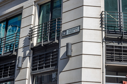 Street Name Sign for Monument Street on Fish Street Hill in City of London, England