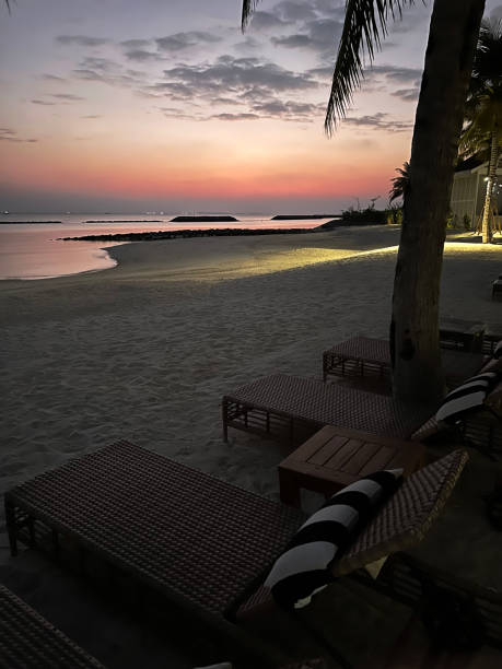 istock benches are on beach at sunset from maldives vertical photo 1468930006