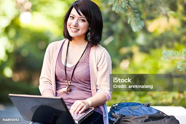 Mixed Race College Student With Laptop Stock Photo - Download Image Now - Adolescence, Adult, Asian and Indian Ethnicities