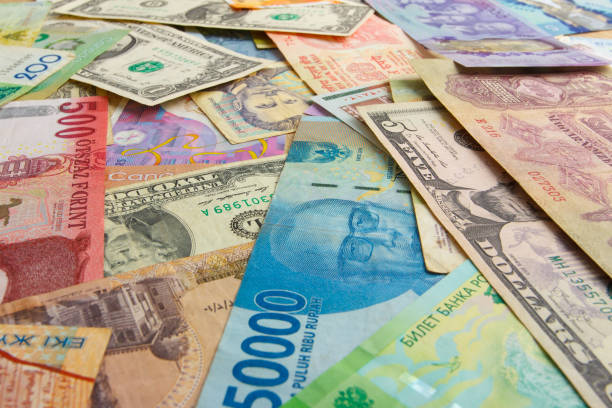 istock Background from different money banknotes from all over the world 1468935257