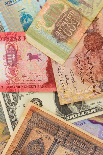 istock Background from different money banknotes from all over the world 1468935274