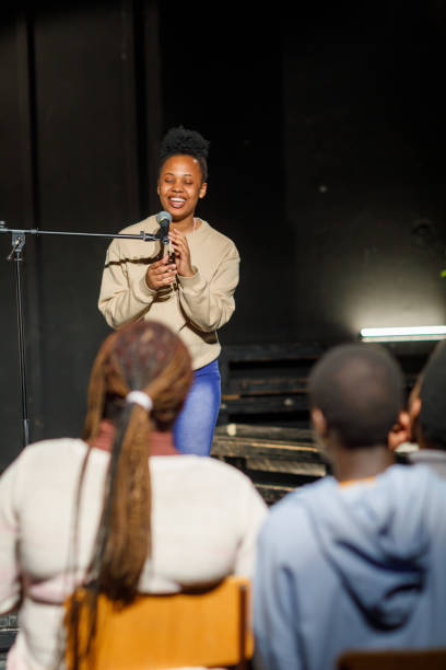 istock Smiling Stand Up Comedian On Stage 1468938807