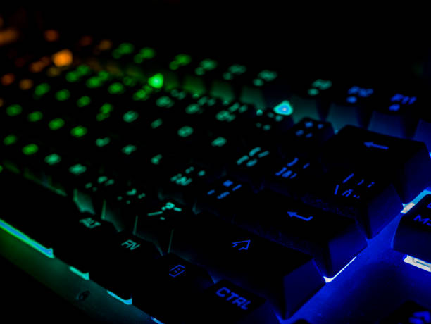 istock Color backlit gaming keyboard glows in the dark 1468939652