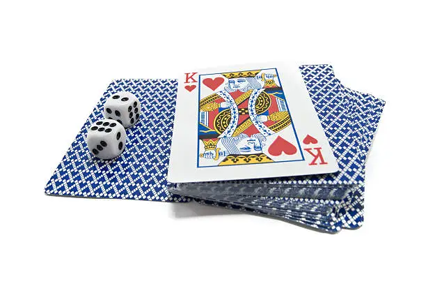 playing-cards and bones are isolated on white