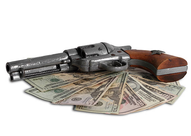 istock Money and a gun on  Wild West 146894779