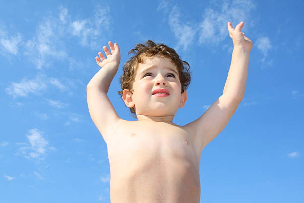 Little boy outdoors stock photo