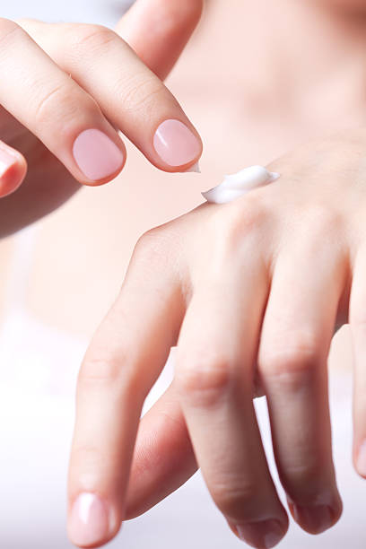 istock Cream on the women hand. 146895824