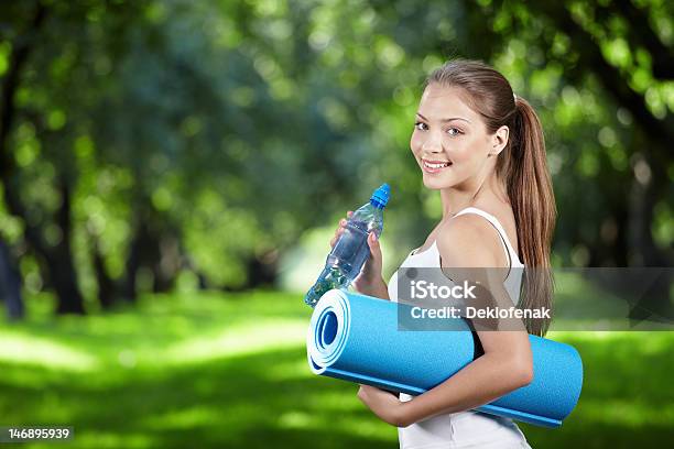 Sports Girl Stock Photo - Download Image Now - Bottle, Exercise Mat, Outdoors