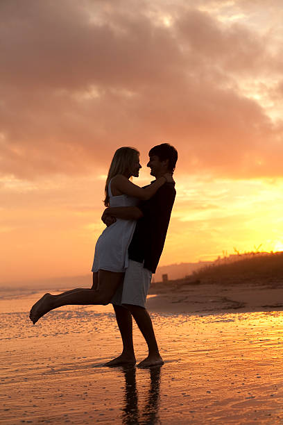 istock Young Couple at the Beach 146896448