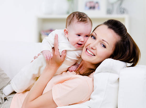 istock Happy mother with little baby 146896953