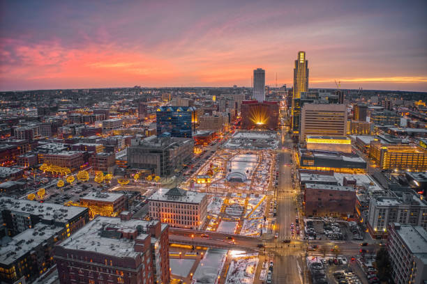 Aerial View of a Winter Sunset in Omaha, Nebraska with Holiday Lights stock photo