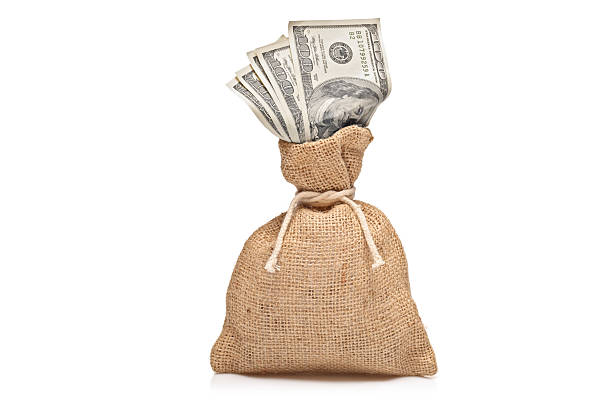 istock Money bag with US dollars 146897654
