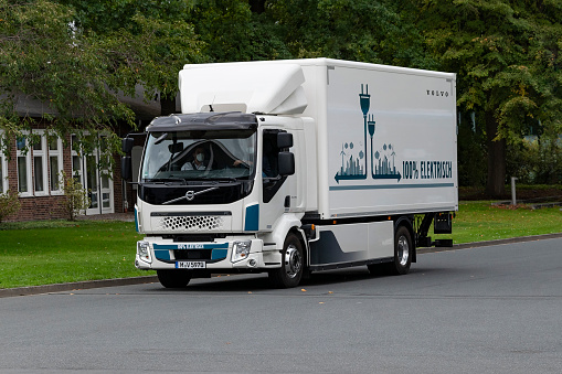 Hannover, Germany - 20 September, 2022: Volvo FL Electric truck on a street. This model is one of the most popular electric trucks in Europe.