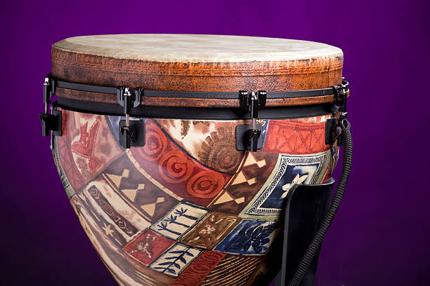 istock African Latin Djembe Drum On Purple 146899268