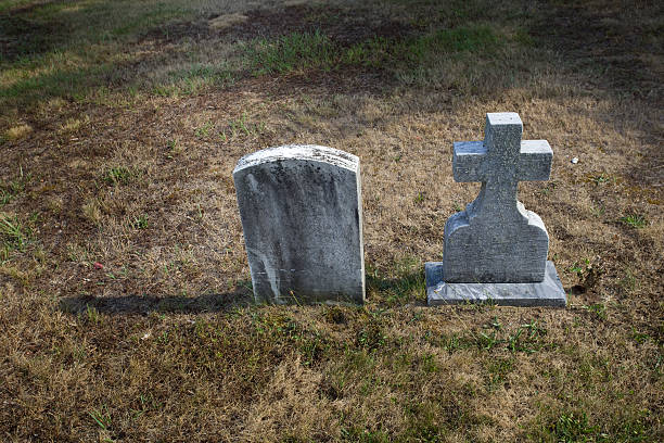 Two small tombstones stock photo
