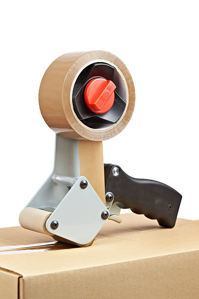 istock Packaging tape dispenser and shipping box 146899545