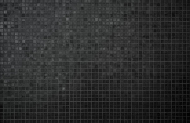 istock Black tile wall high resolution real photo or brick seamless pattern and texture interior room background. Dark grid tiles wall texture for the decoration of the bedroom, Home or office backdrop. 1469002445