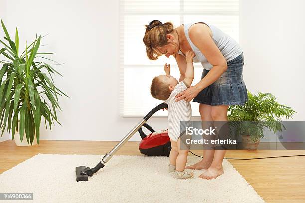 Mother Cleaning The Floor Stock Photo - Download Image Now - Baby - Human Age, Carpet - Decor, Cleaning