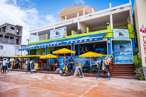 Philipsburg, Sint Maarten - January 3, 2023: Colorful bar along the beach in Philipsburg.