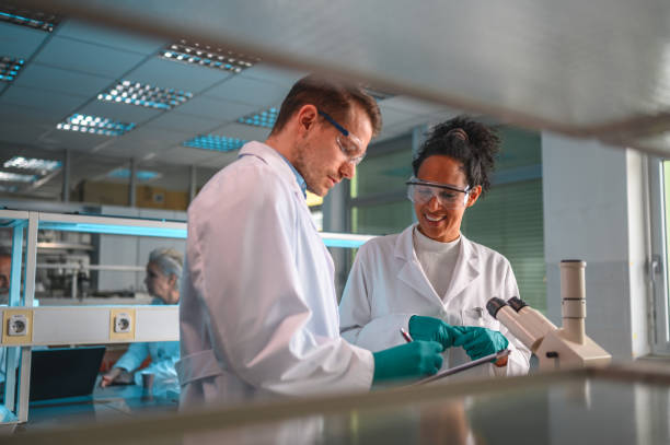istock Mixed Team of Doctoral Level Students at the Lab 1469005123