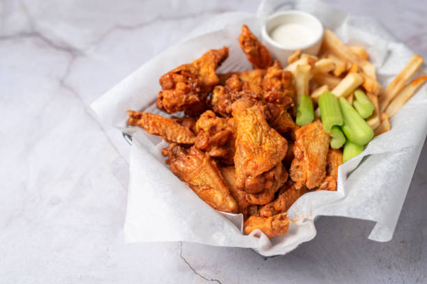 istock Buffalo chicken wings with celery and dip 1469014591