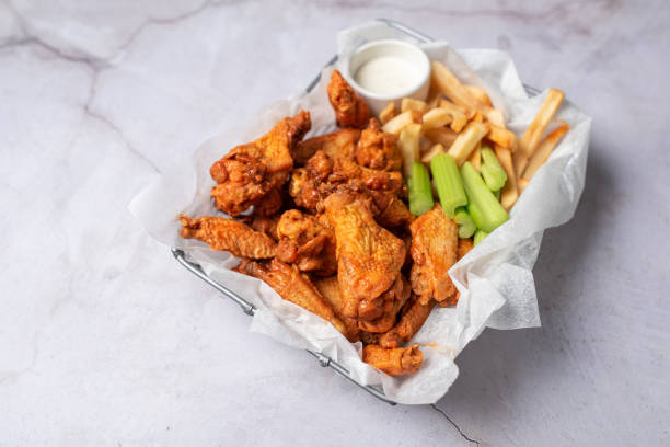 istock Buffalo chicken wings with celery and dip 1469014619